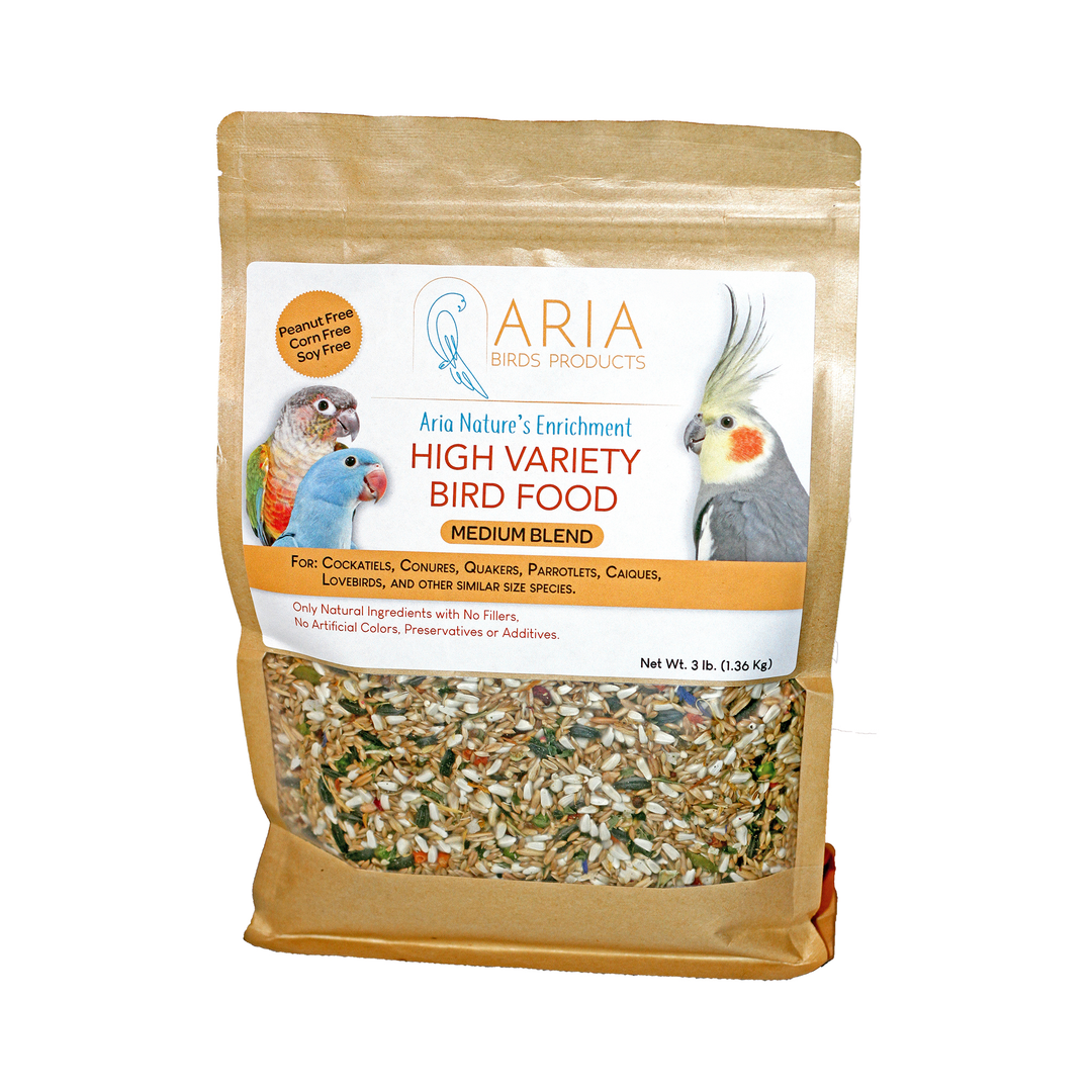 A 3 lb bag of Aria Birds Products High Variety Bird Food Medium Blend, featuring a kraft paper stand-up pouch with a clear window showing the mixed birdseed inside, and a white label with bird photos.