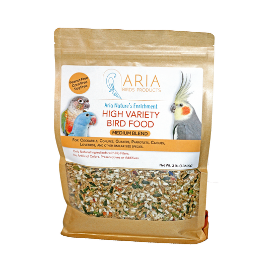 A 3 lb bag of Aria Birds Products High Variety Bird Food Medium Blend, featuring a kraft paper stand-up pouch with a clear window showing the mixed birdseed inside, and a white label with bird photos.